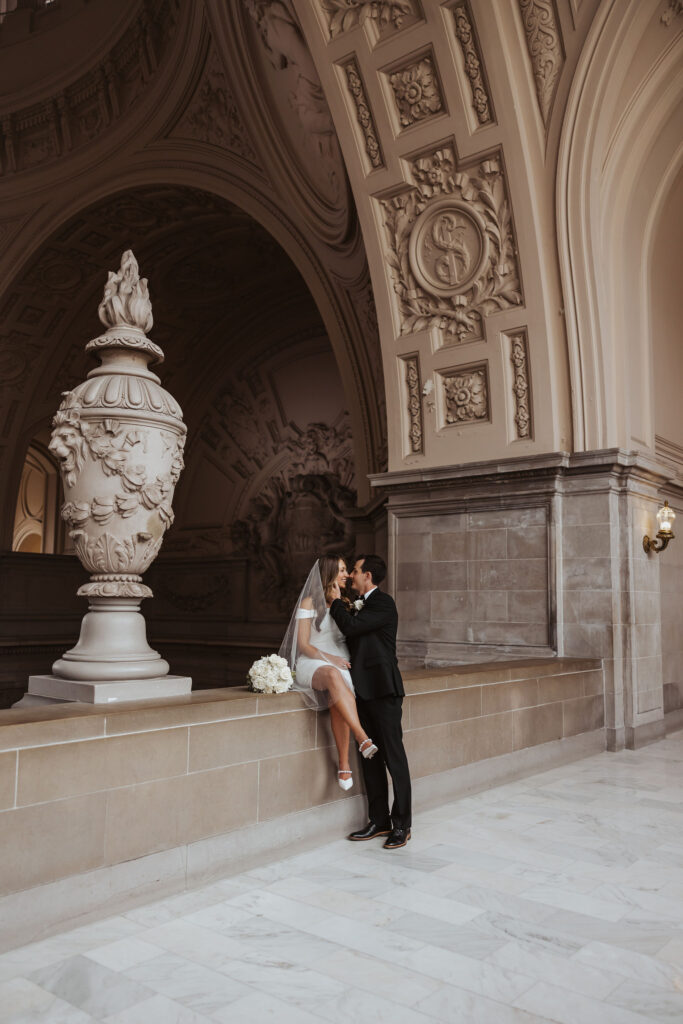 bride and groom photos in City hall in California