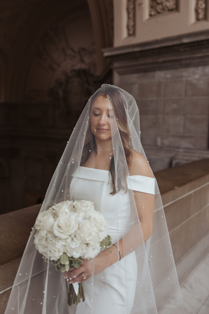 bride wedding portrait with pearl veil
