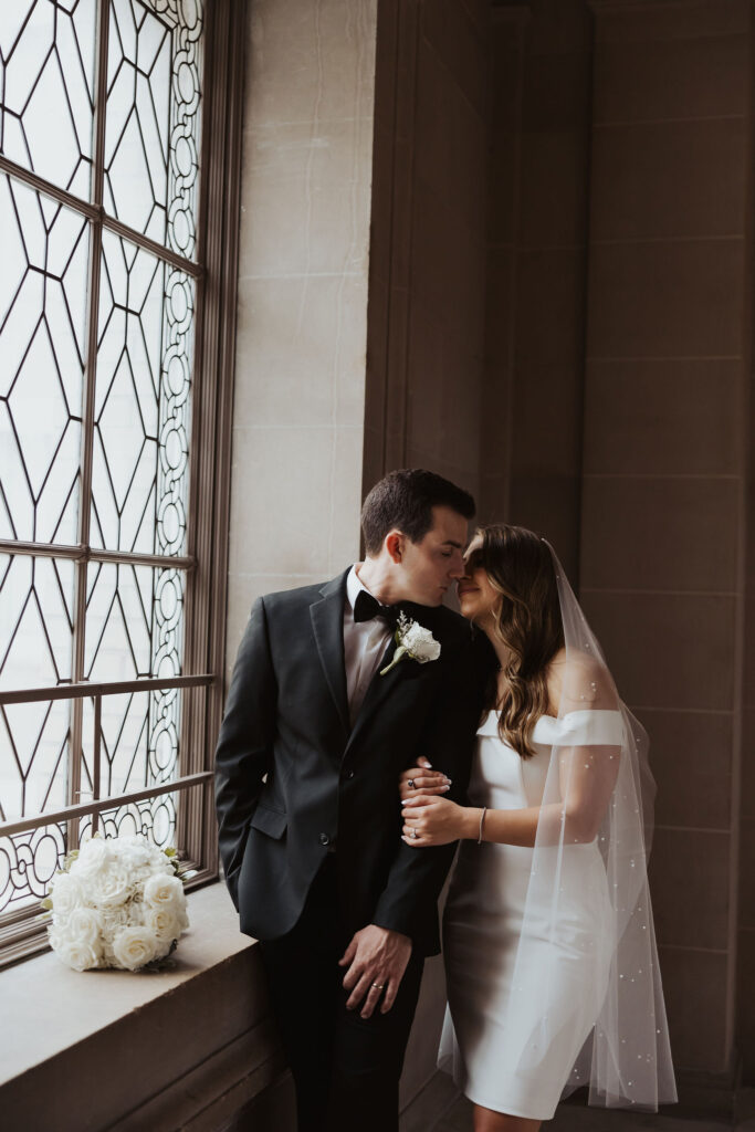 bride and groom photos in City hall in California